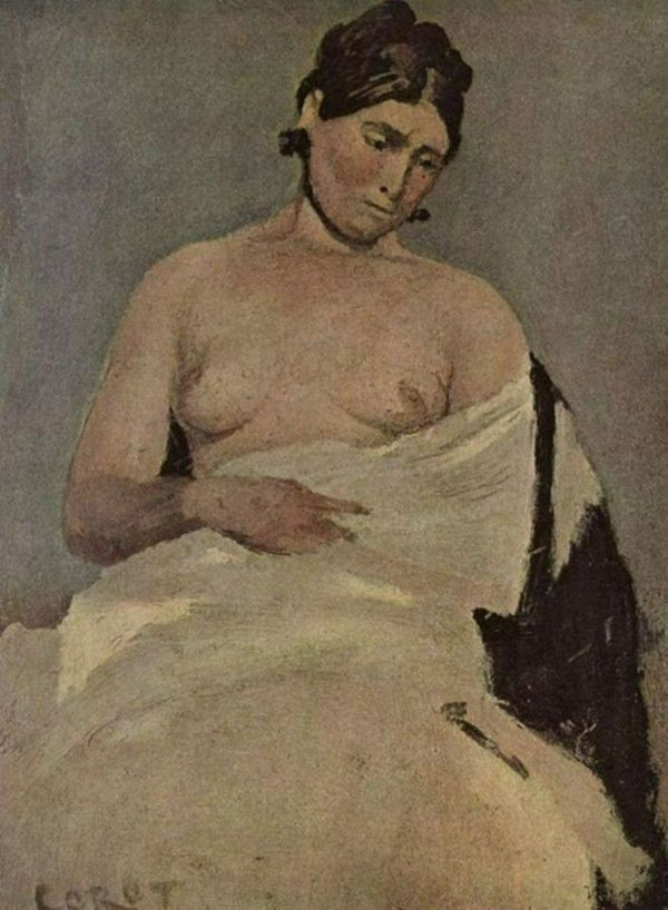 Sitting woman with bare breasts 